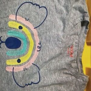 Adorable shirt features a colorful koala graphic